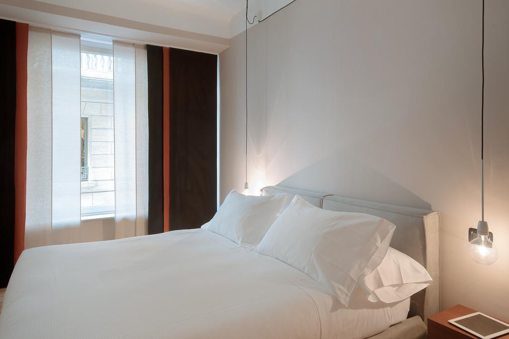 Fifty Eight Suite Milan Center Milão Quarto foto
